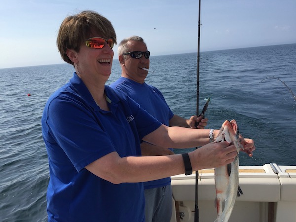 Sue Catching Coho Salmon up in Kenosha